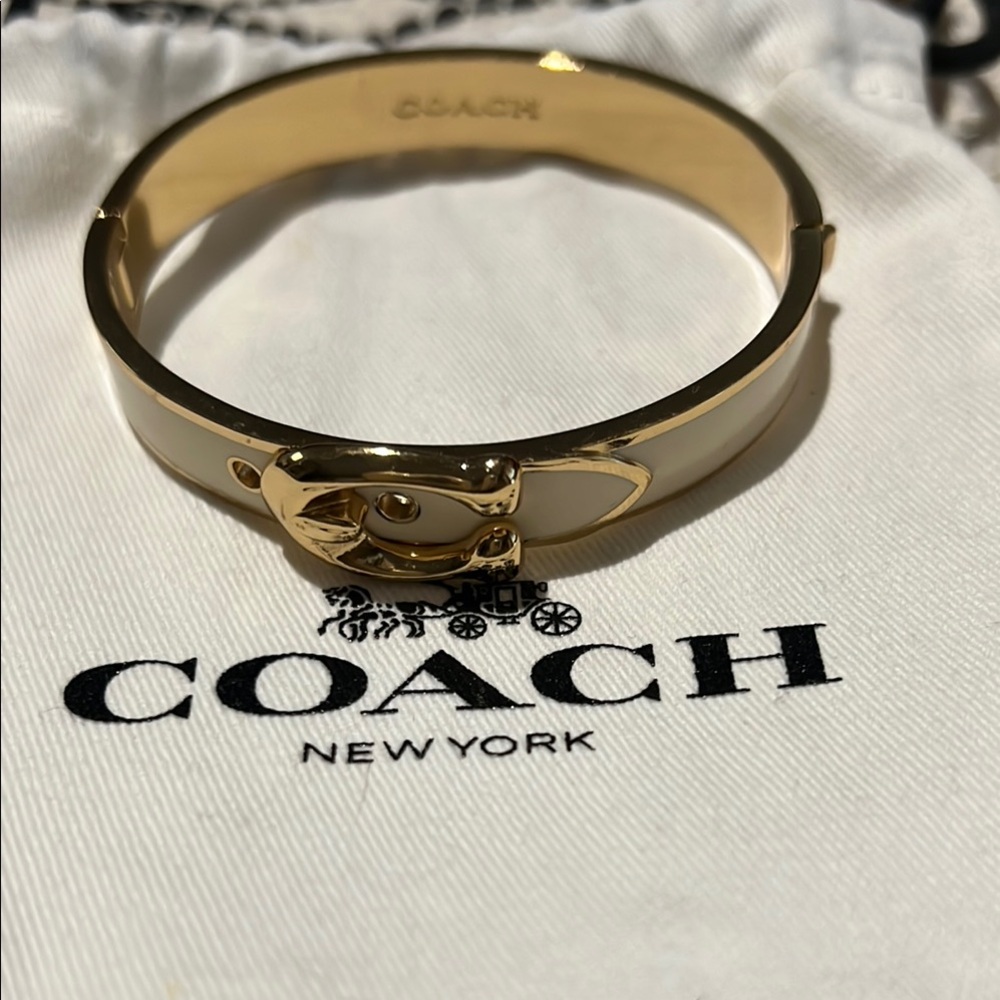 Coach Gold and Cream Bangle Bracelet 

New…never worn